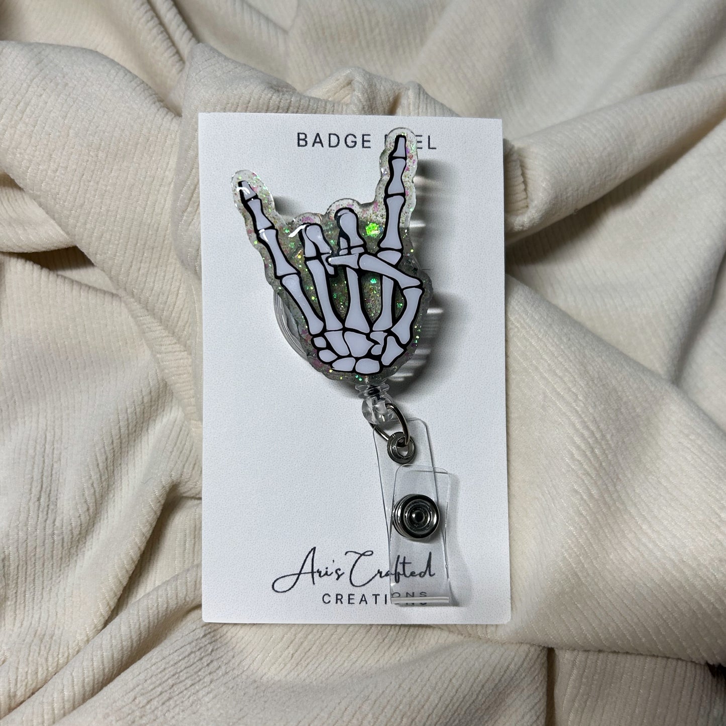 skeleton hand - badge reel