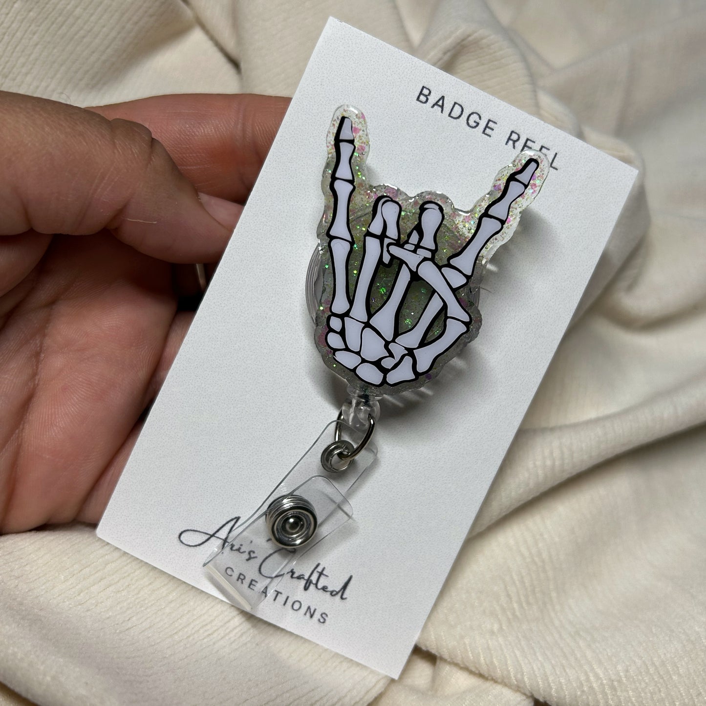 skeleton hand - badge reel