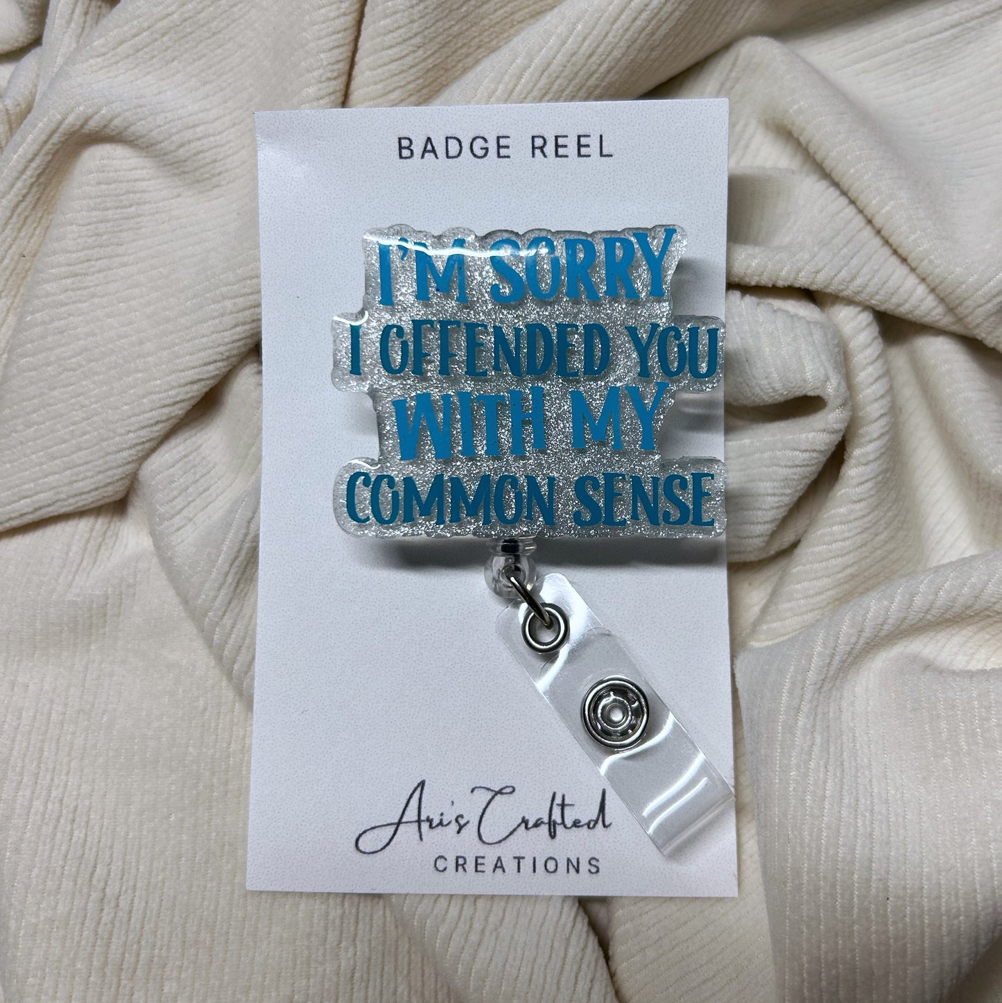 common sense - badge reel