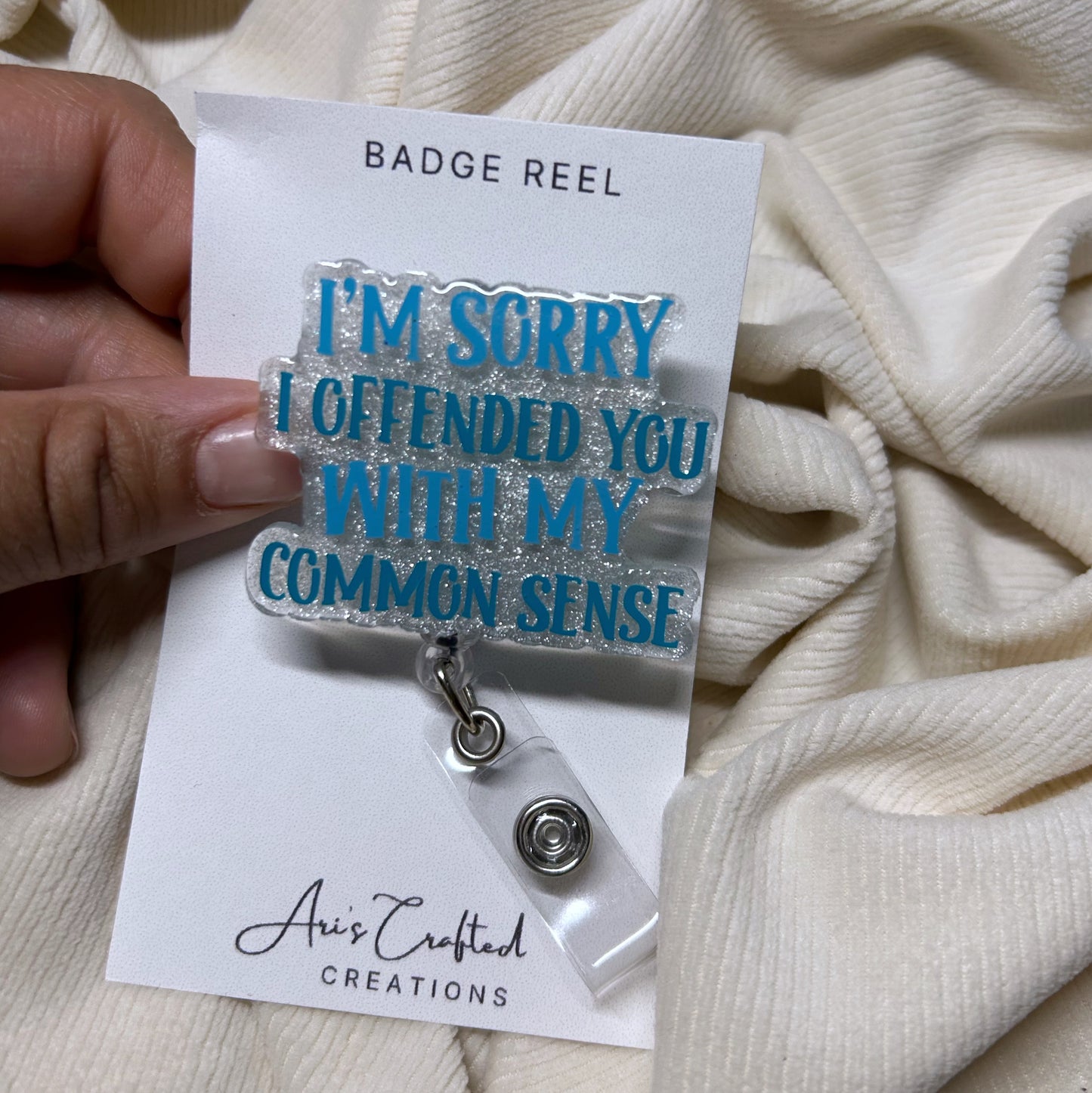 common sense - badge reel