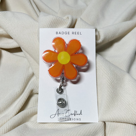 orange flower - badge reel